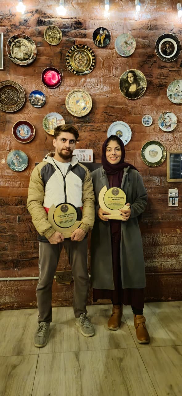 Two international MMA fighters from Swat with their championship awards, guests at The Vintage Home