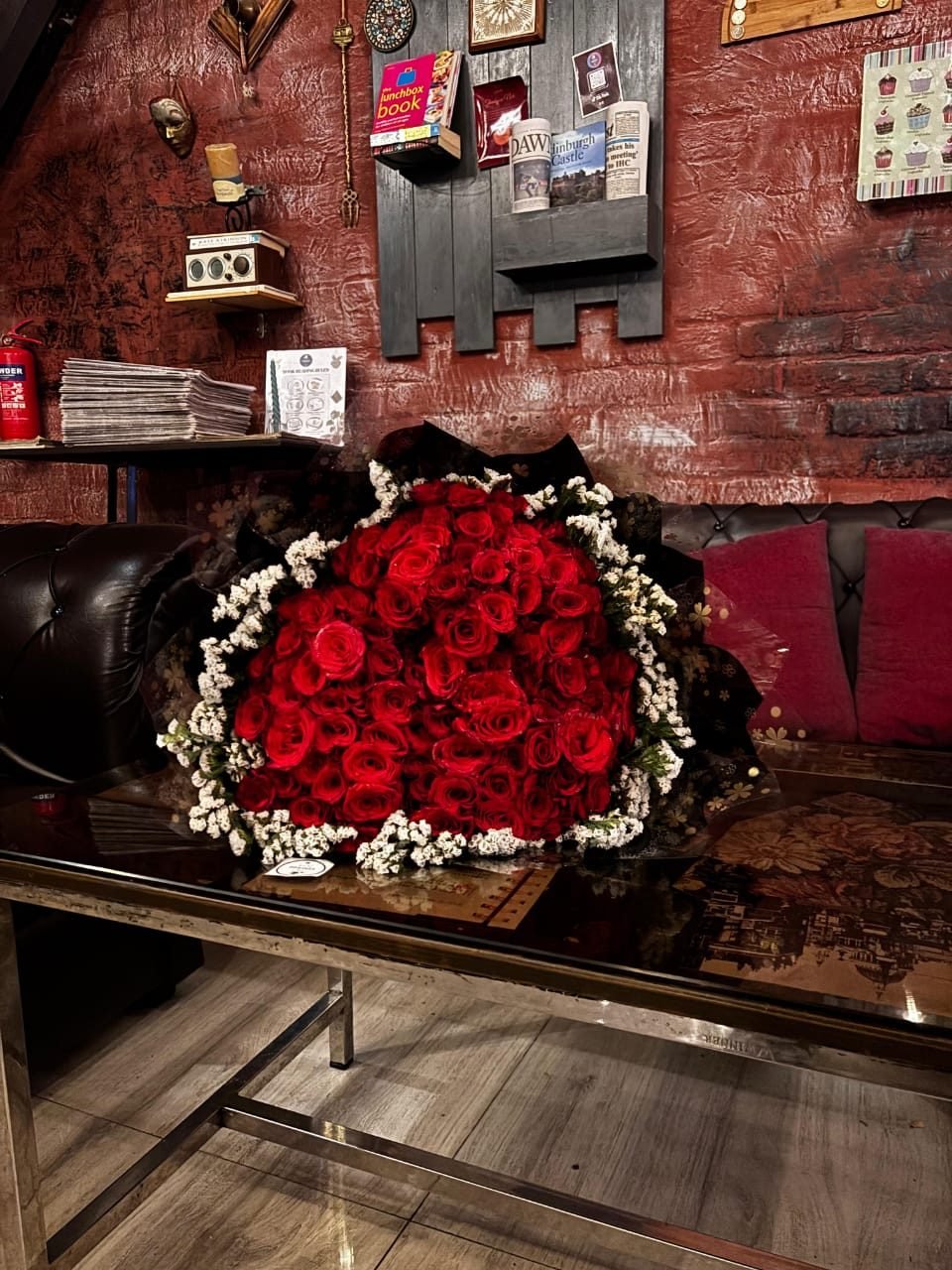 A large bouquet of red roses
