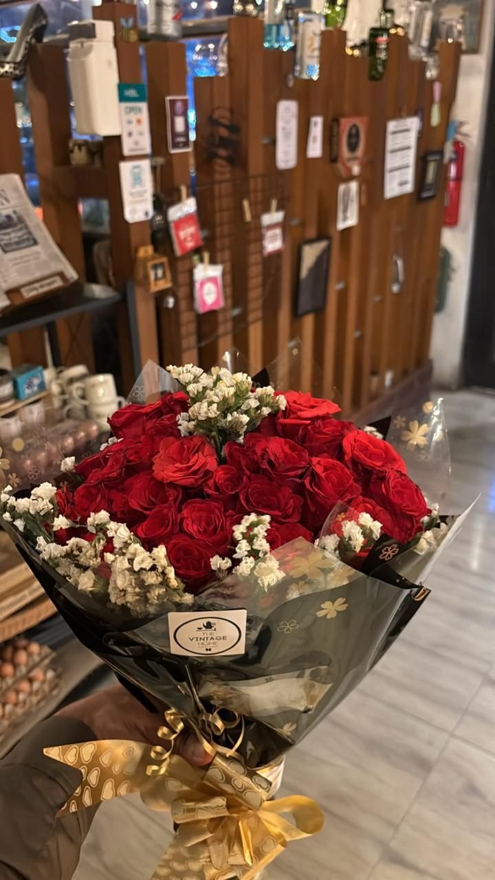 A small bouquet of red roses