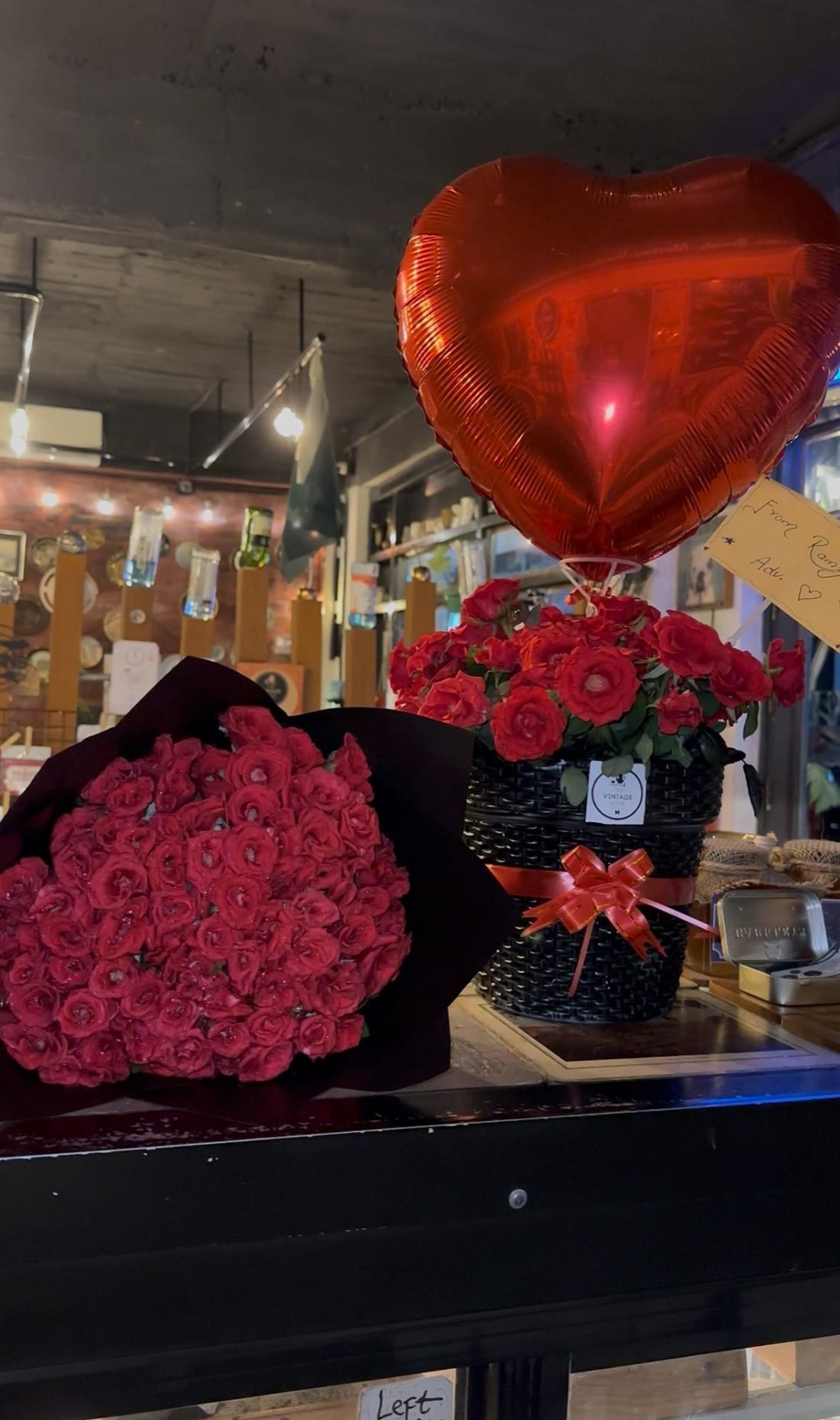 A flower basket with a balloon