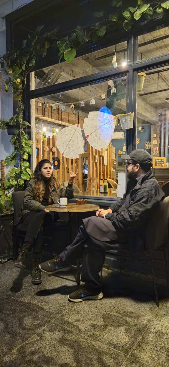 Two guests at a late table